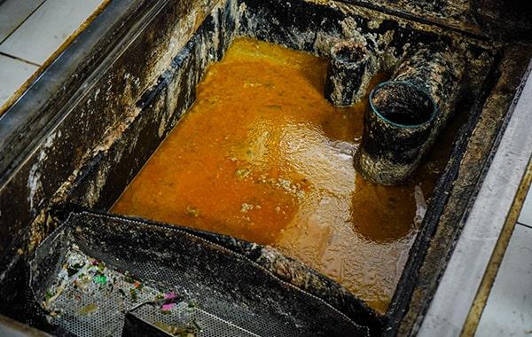 it's recommended to hire professionals for grease trap cleaning due to the specialized equipment and knowledge required